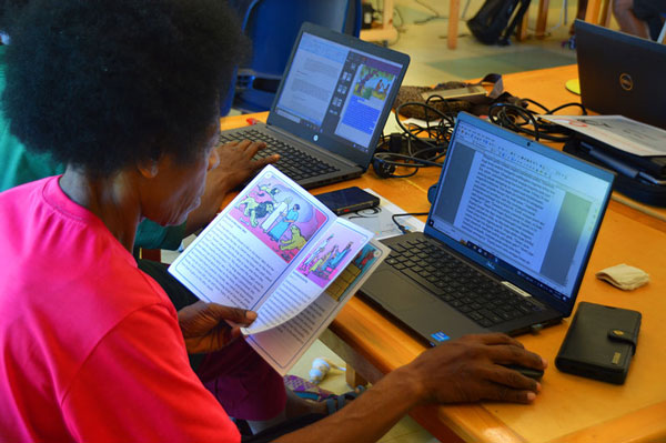 Papua New Guniea Northeast Cluster working on translation of the Look Listen and Live series